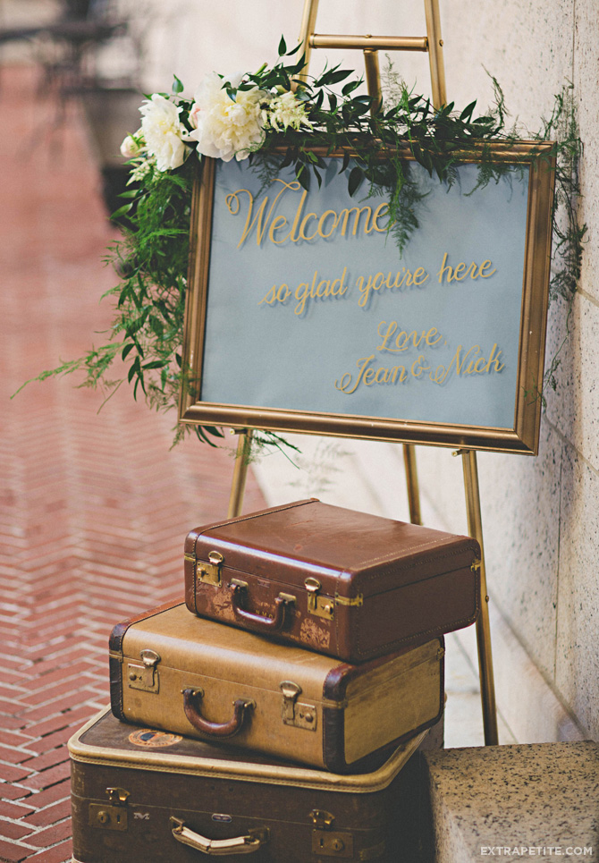 boston library wedding vintage suitcases welcome sign