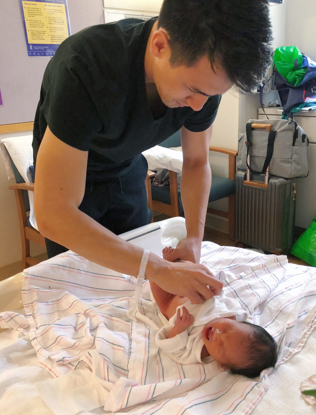 extra petite blog dad diaper change newborn baby